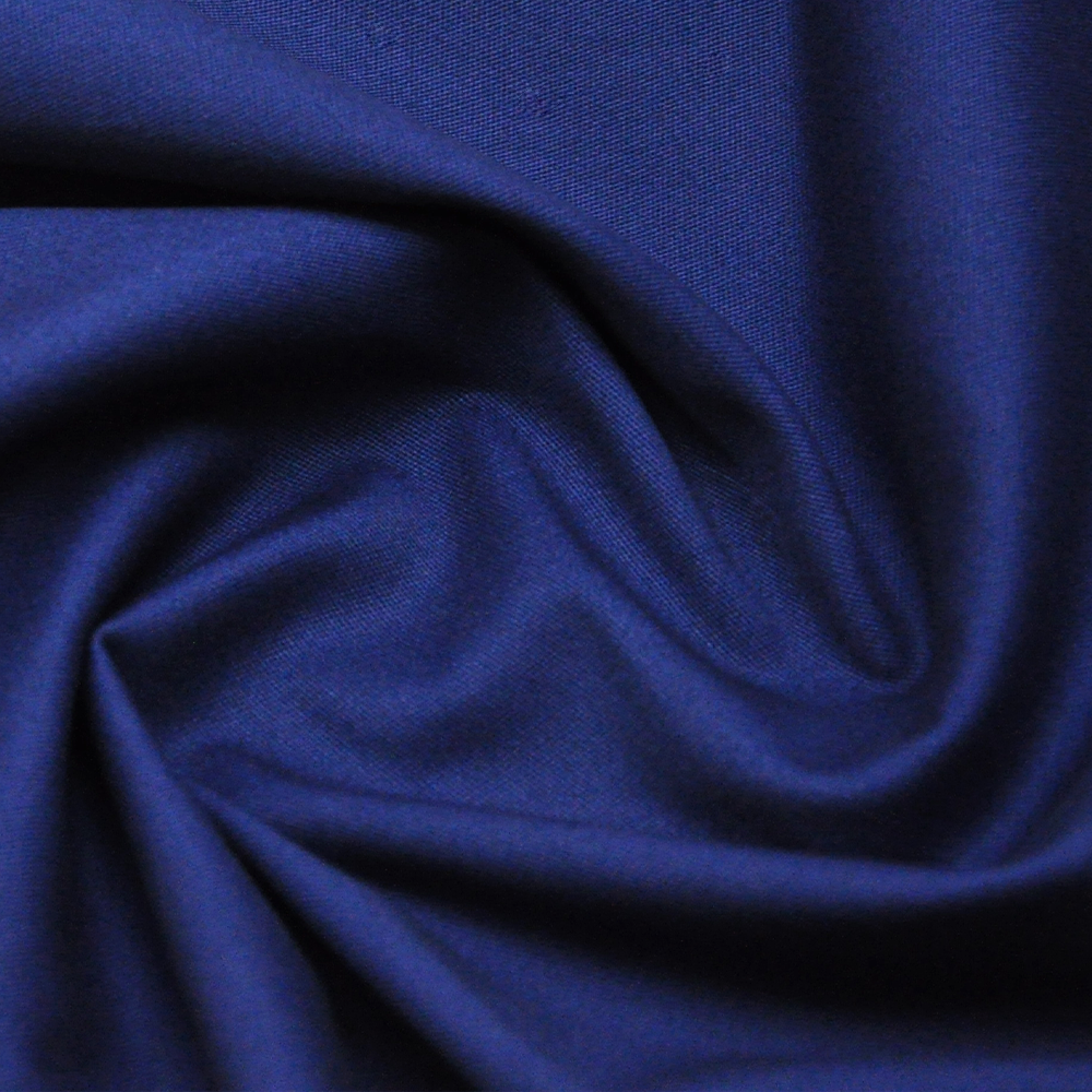Tissu sergé 39 % nylon, 53 % coton, 8 % élasthanne pour pantalons