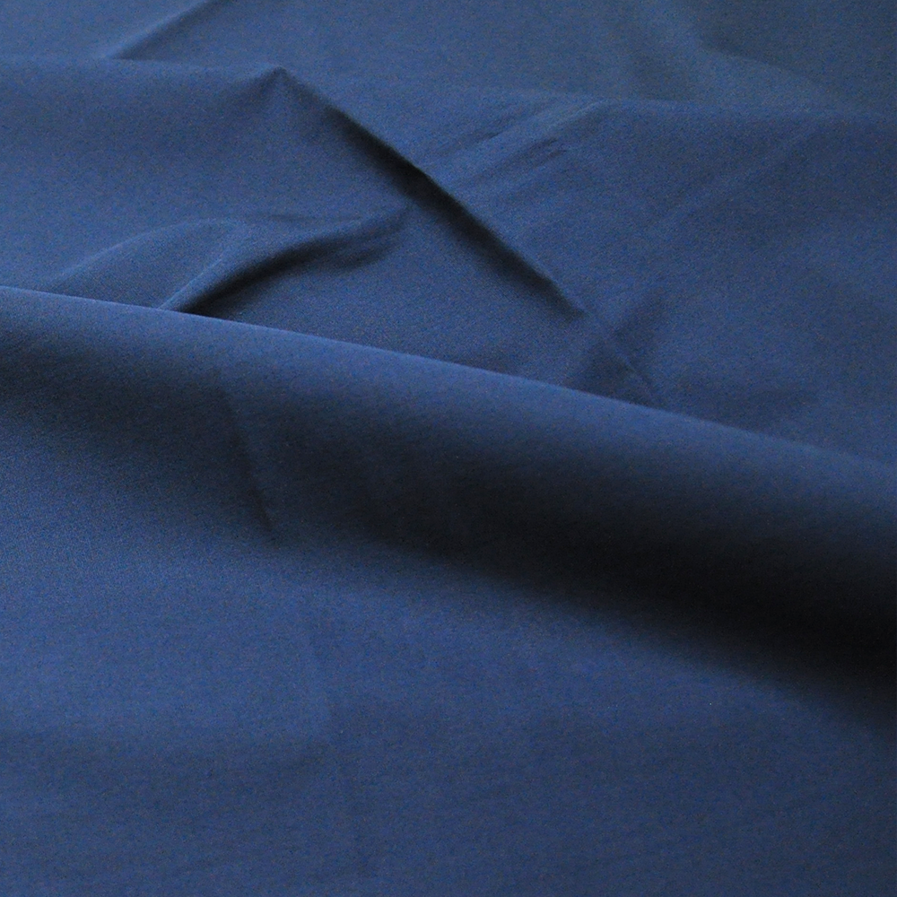 Tissu 70 % coton 30 % nylon bleu